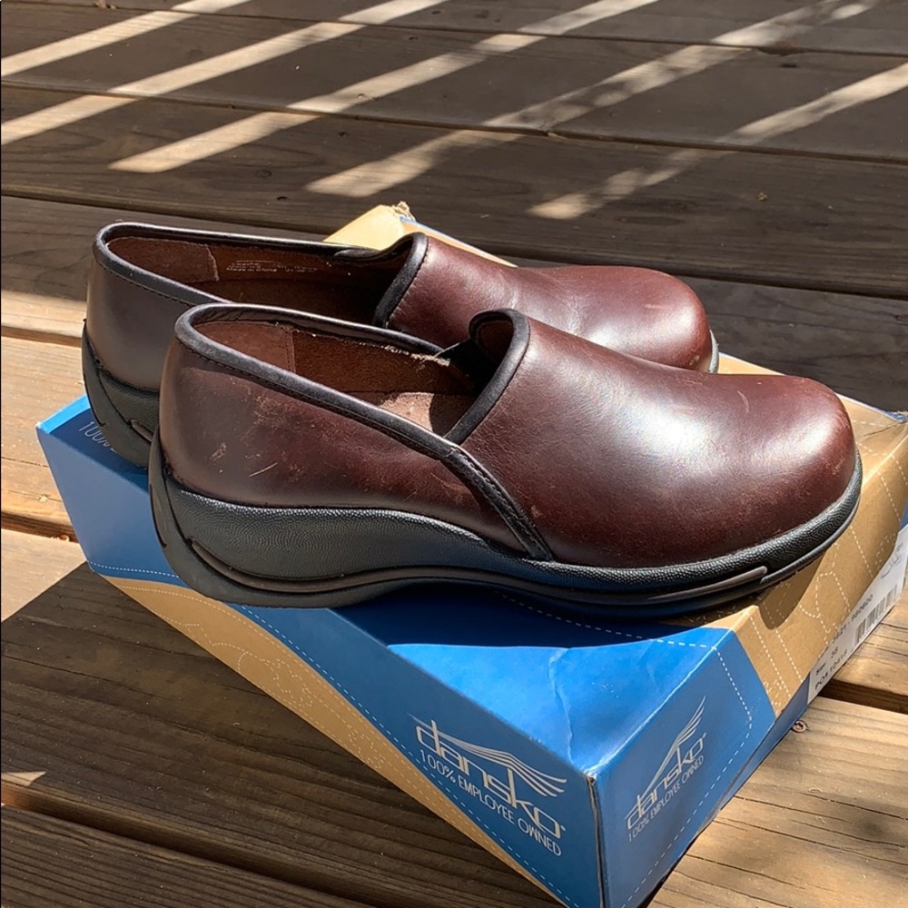 Dansko leather clogs. Never worn.